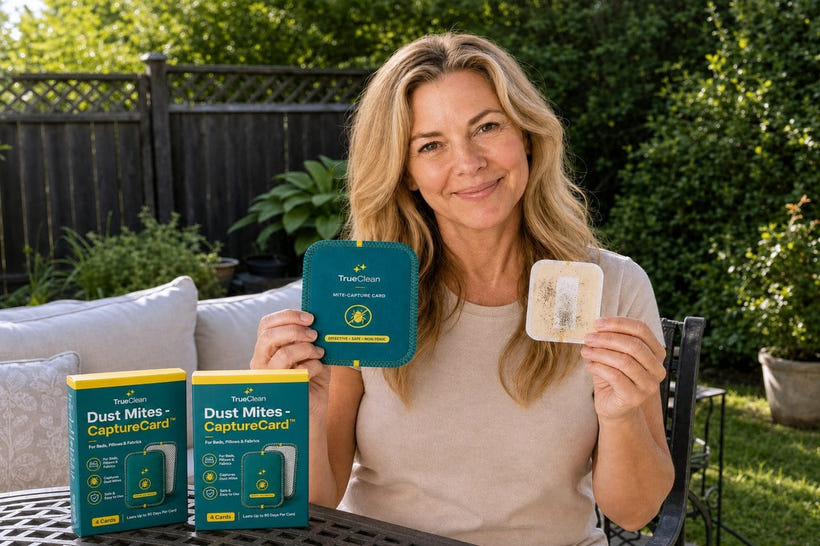 Woman holding TrueClean CaptureCards and catch sheet on a patio